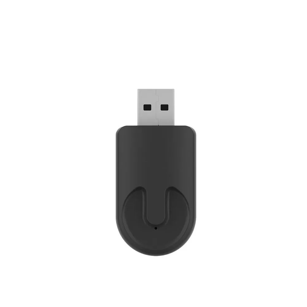 Small black Mini 2-in-1 CarPlay wireless USB adapter showing compact size and USB connector.