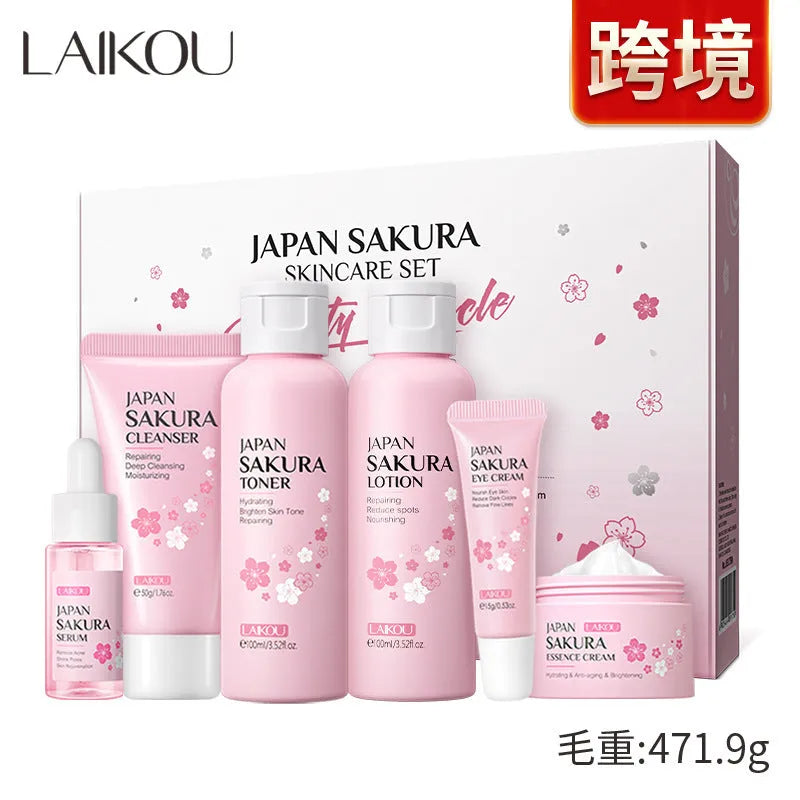 Cherry Blossom six-piece skincare set showing cleanser, toner, cream, essence, eye cream and essence cream