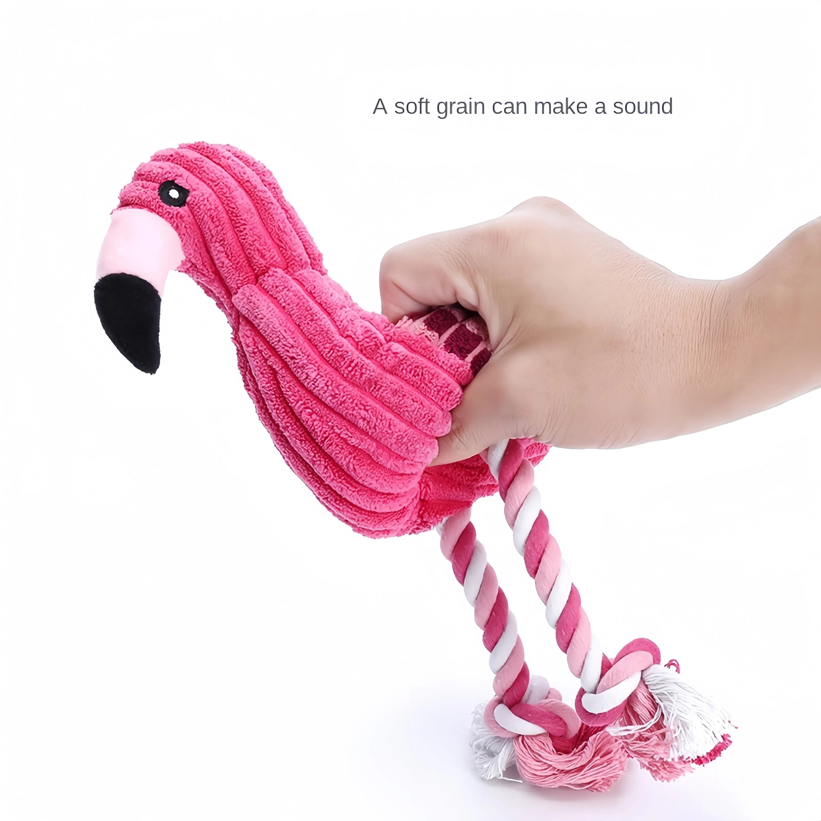 Pink animal-shaped corduroy squeaky dog toy with plush construction