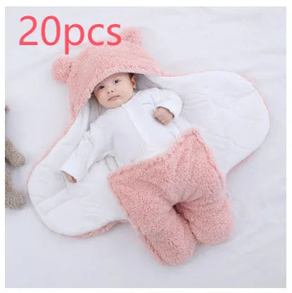 A baby quilted sleeping bag wrapper in a plain colour, showing its quilted pattern and soft cotton blend fabric.