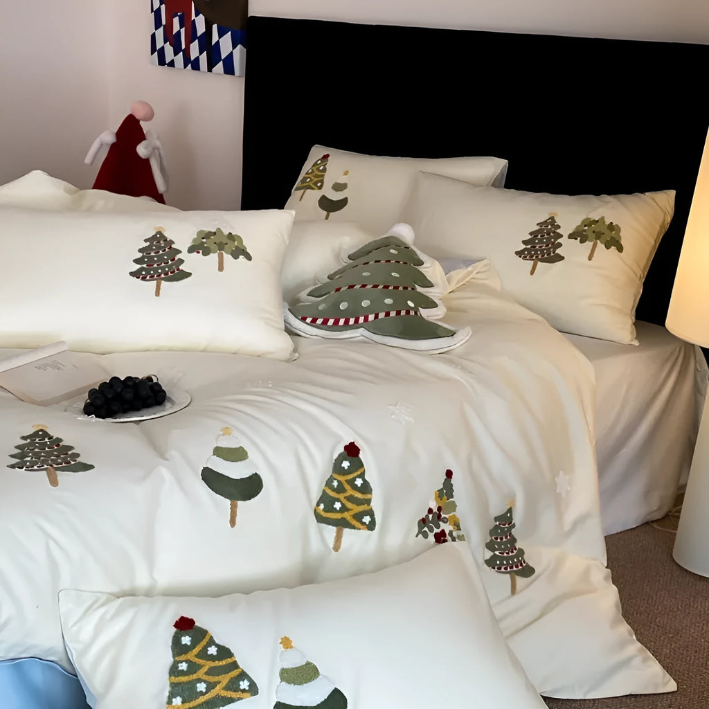 Pure cotton four-piece bed set with embroidered Christmas tree pattern in cream blue and green colours.
