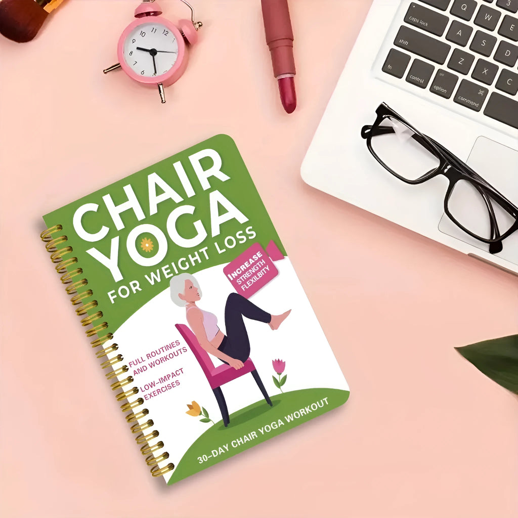 Green coil-bound notebook with 30 days chair yoga training guide content