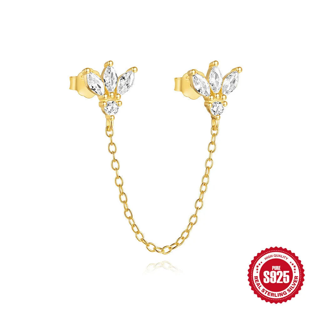 S925 sterling silver stud earring with golden double piercing design and zircon inlaid detail on a white background.