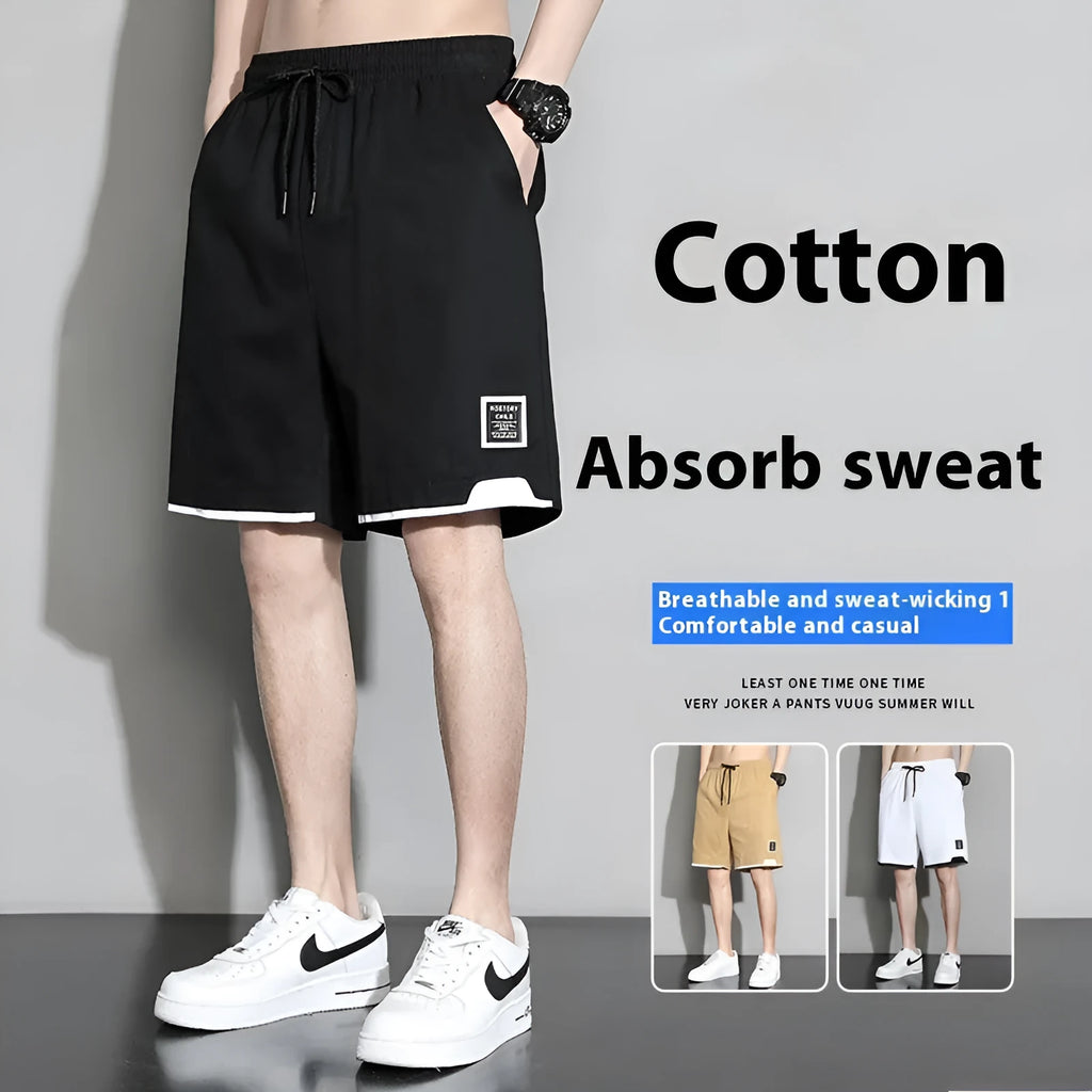 Boy wearing black cotton plus-size shorts with a mid-waist and casual overalls style.