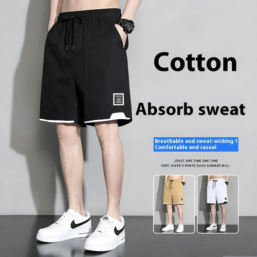 Boy wearing black cotton plus-size shorts with a mid-waist and casual overalls style.