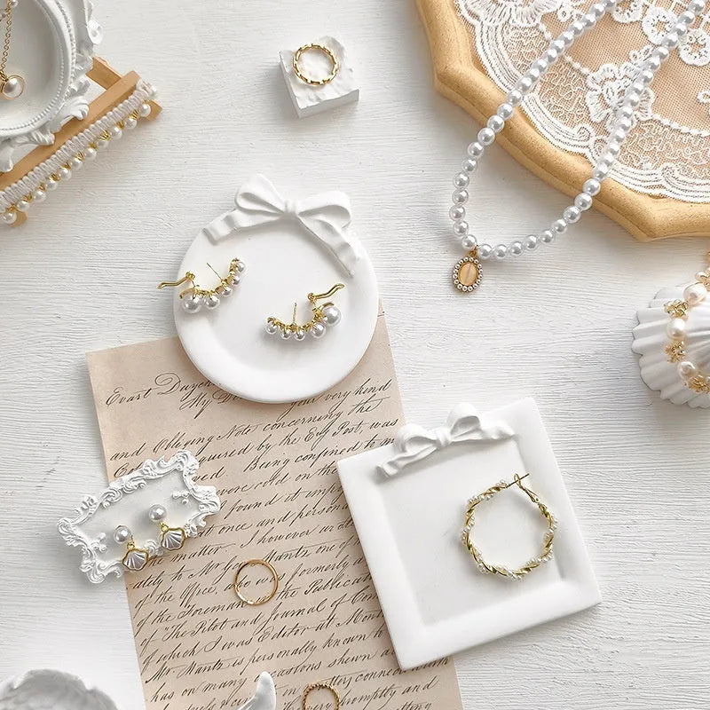 European-style Baroque gypsum jewellery display plate with ornamental detailing, available in tray, bow board, and wing plate sizes