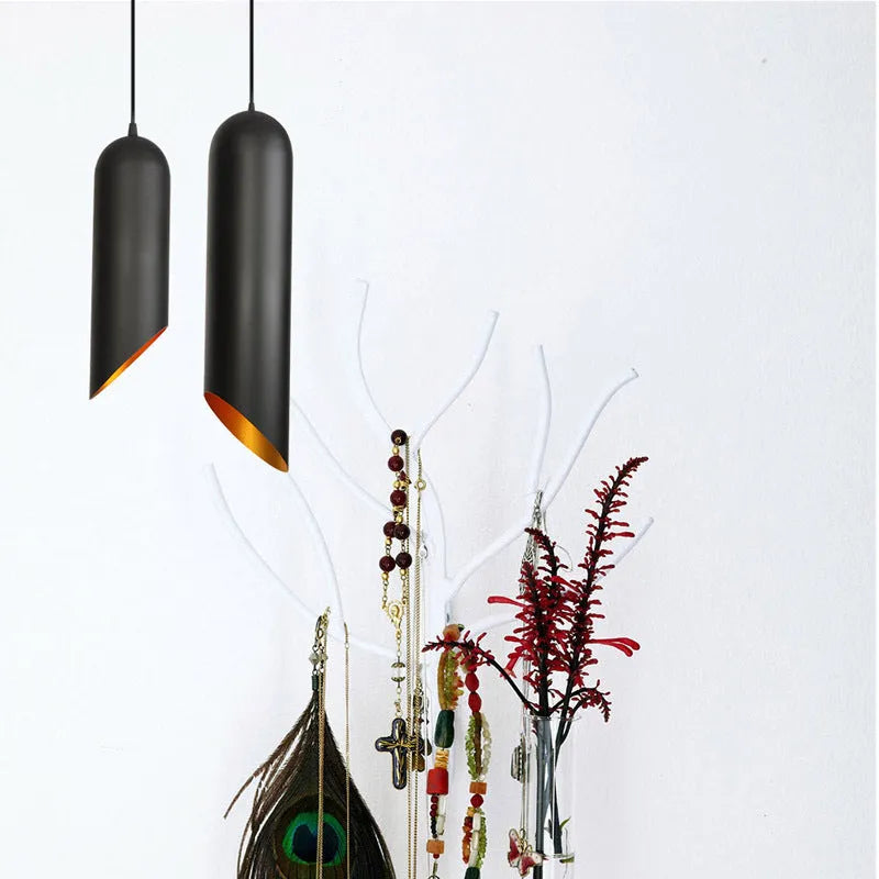A simple retro-style iron art chandelier in matte black finish, shown mounted on a ceiling.