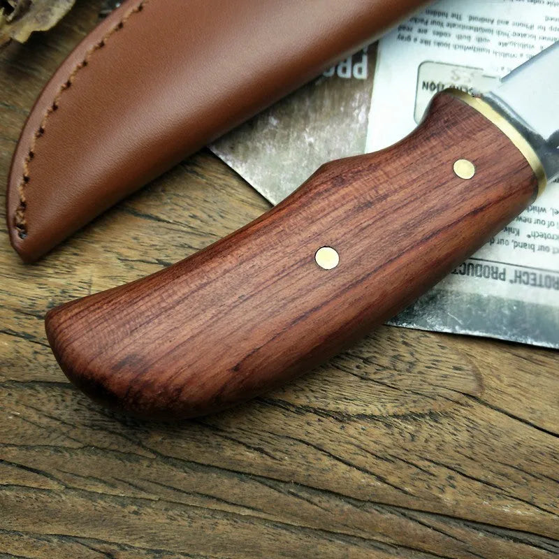 Outdoor survival knife with brown mahogany handle and 8cm stainless steel blade on wooden surface