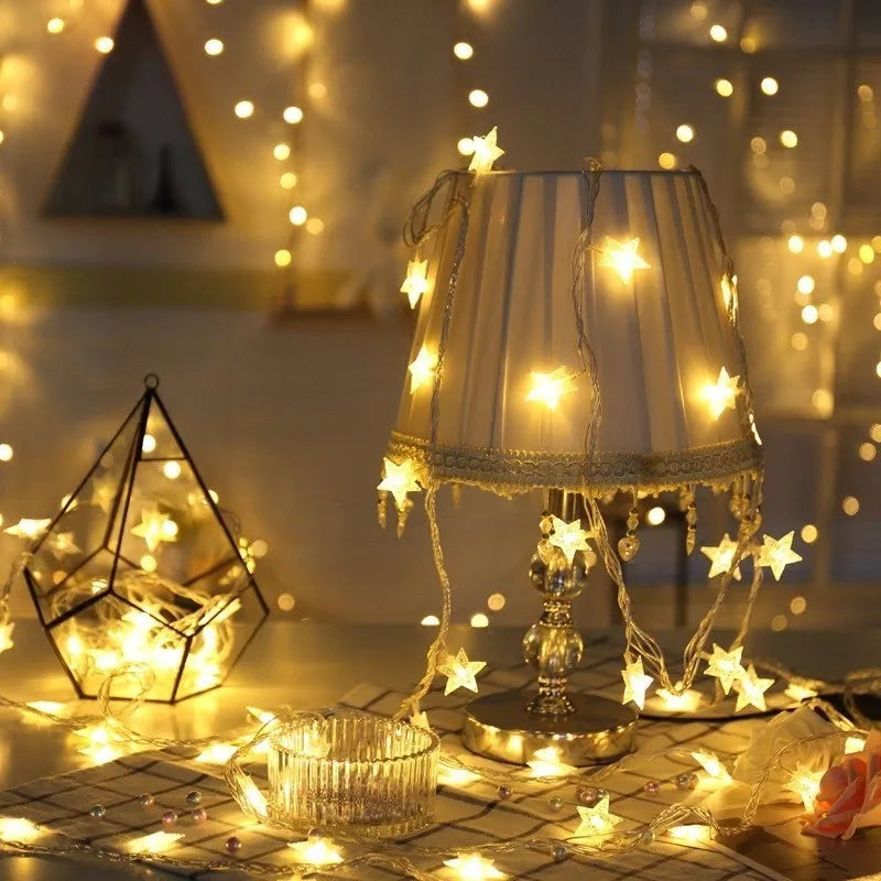 LED five-pointed star string lights with copper wire in warm white colour