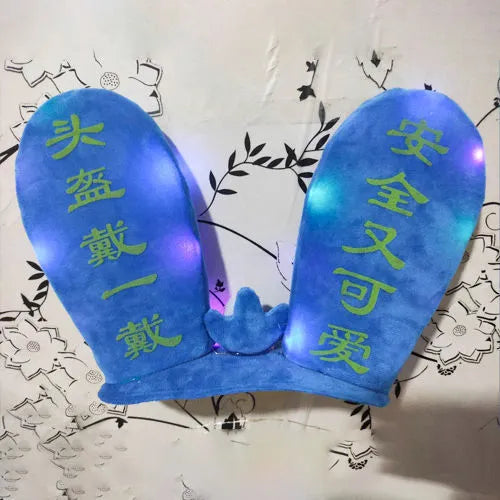 Rabbit Glow helmet decoration with Velcro bottom on a ski helmet, shown in blue LED style.