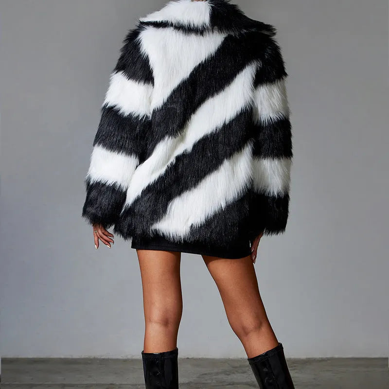 Women's faux fur coat with contrast colour lapels and a removable fur collar.