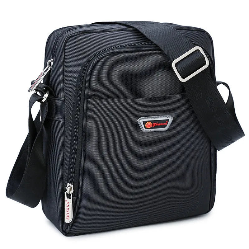 Men's black Oxford cloth messenger bag with zipper closure, single shoulder strap, and printed car-suture outer pocket