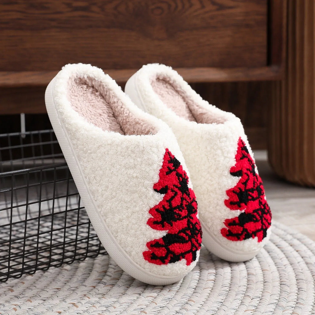 Pair of Christmas tree patterned slippers with plush upper and plastic non-slip sole