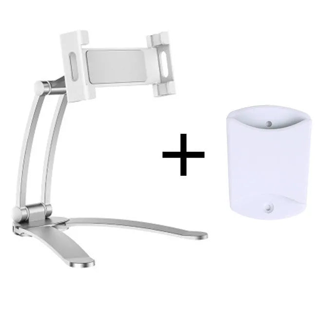 Silver aluminium alloy desktop tablet stand with adjustable holder and white mounting base on a wooden table.