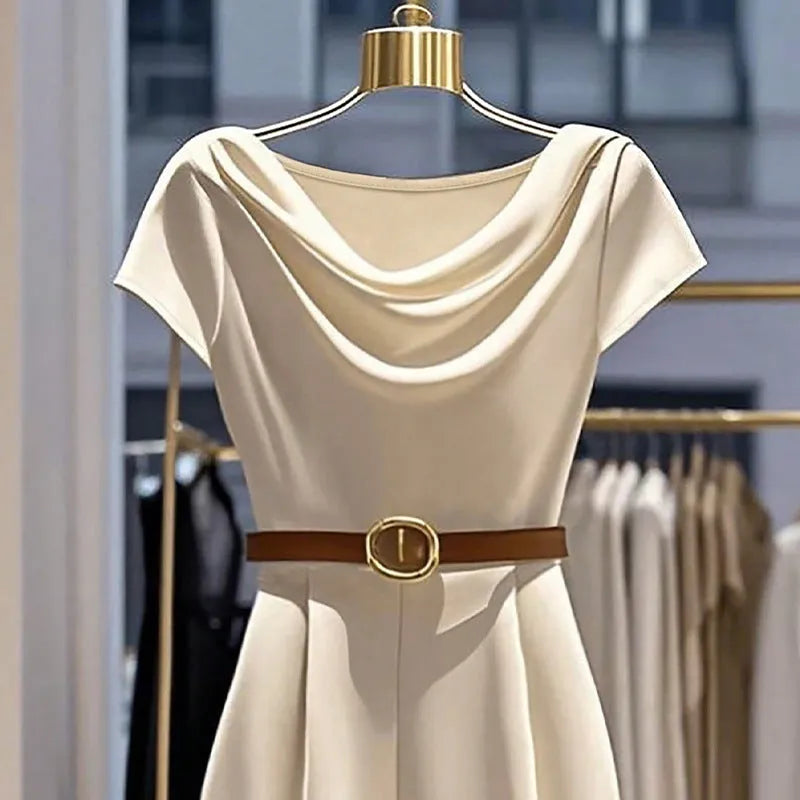 Womens satin jumpsuit in apricot with wide legs quarter sleeves and splicing detail