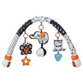 Baby lathe clip hanging plush toy in black and white with pull vibration teether, attached to a cot