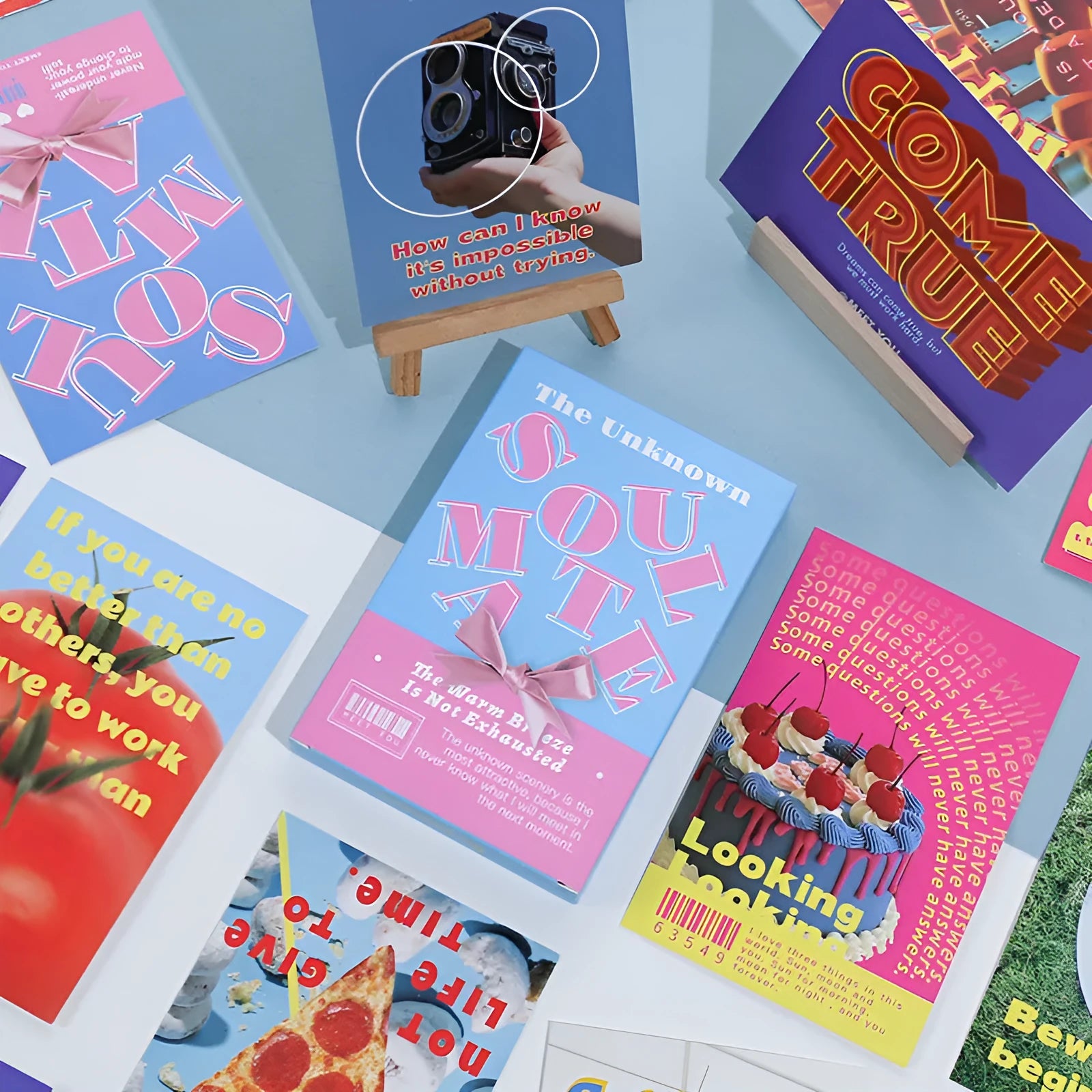 Box of fresh style printed postcards showing two blessing message designs for correspondence