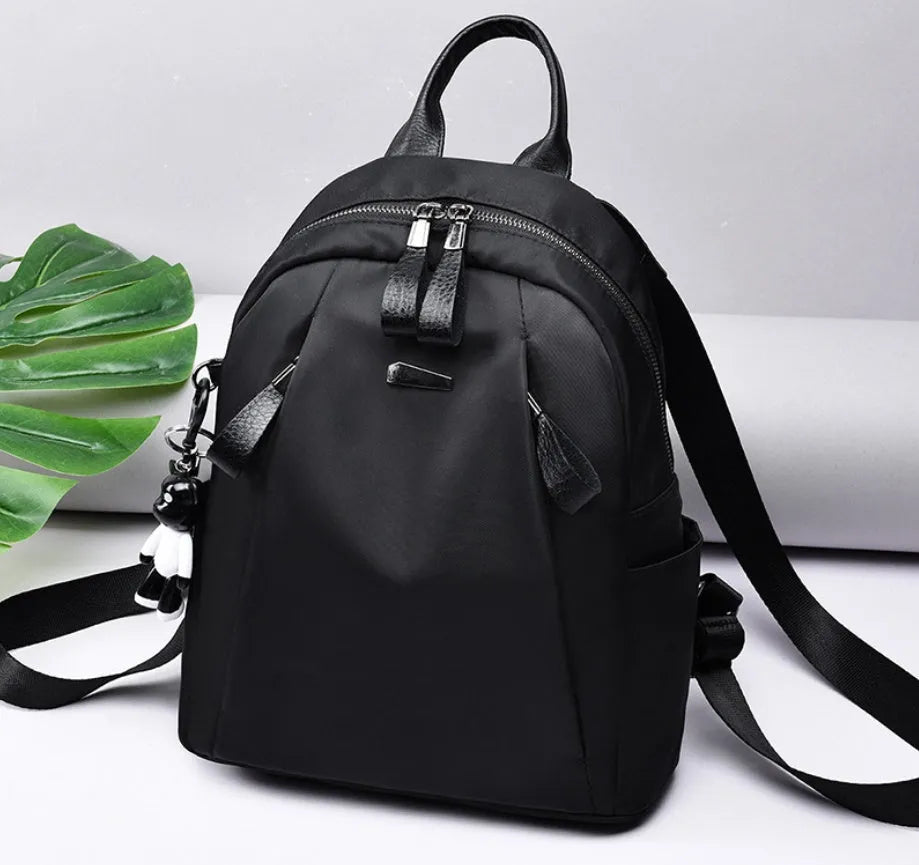Medium square rucksack in Oxford cloth with internal organisers and double straps