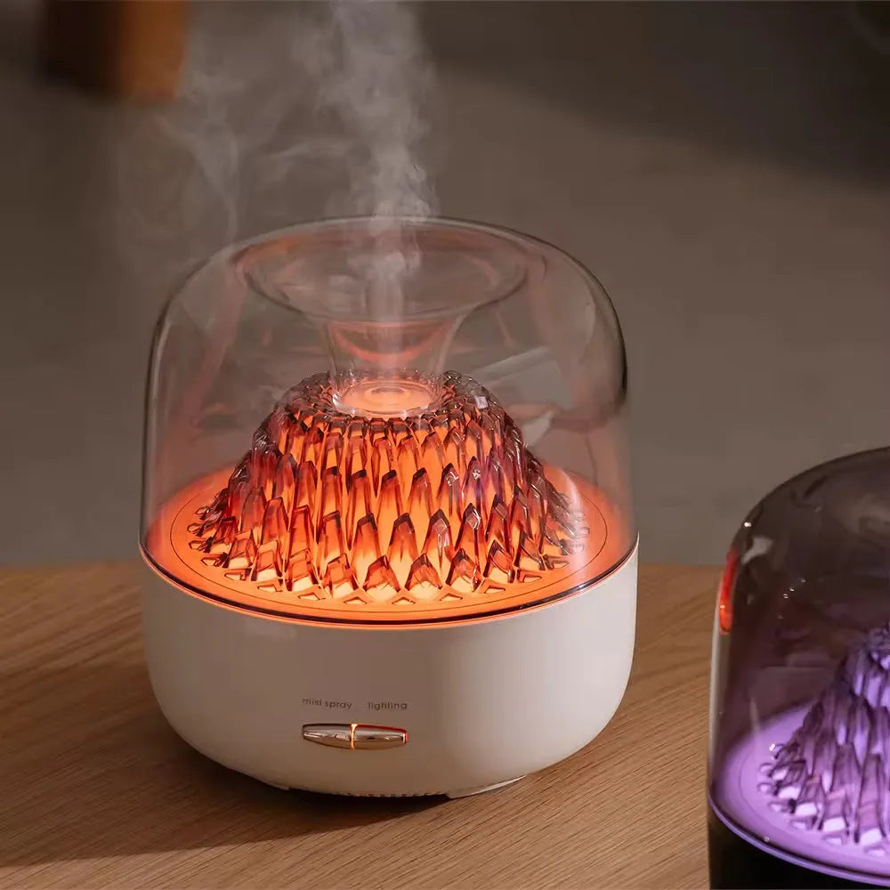 Round beige resin aroma diffuser with one fog outlet and colourful light on a desktop