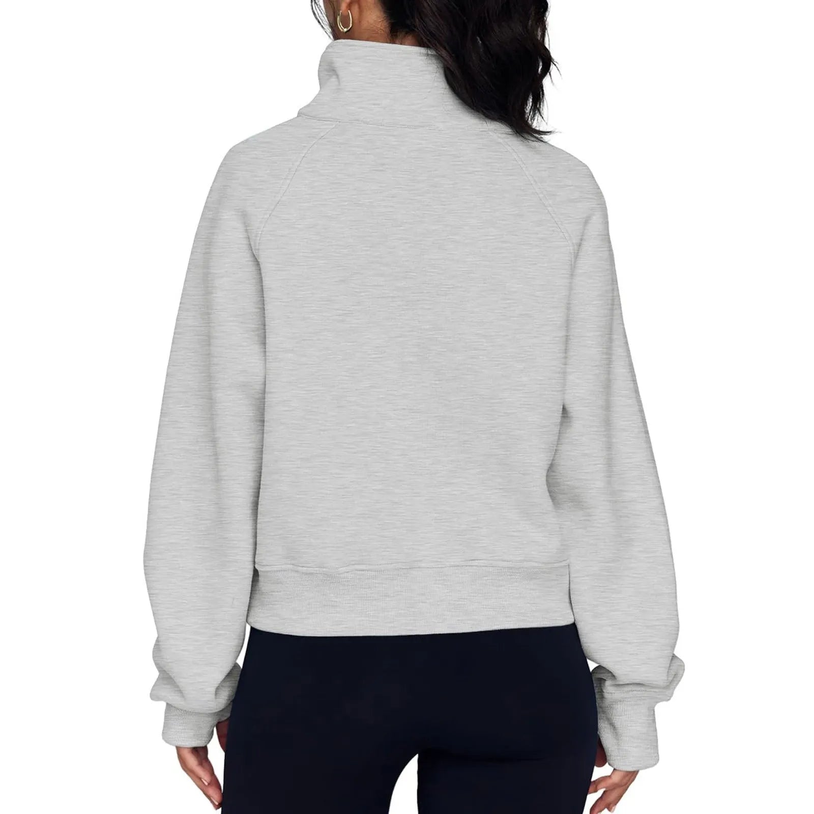 Loose lapel fleece-lined women's sweater in a solid colour, shown with raglan sleeves.