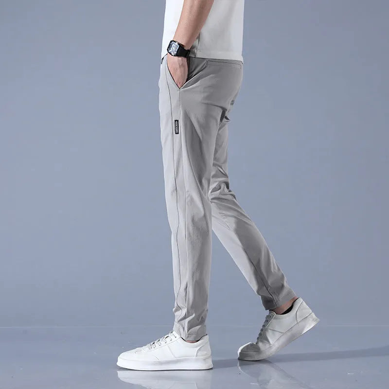 Men's summer ice silk stretch straight sports trousers in loose fit with drawstring, available in black, dark gray, light gray, light green