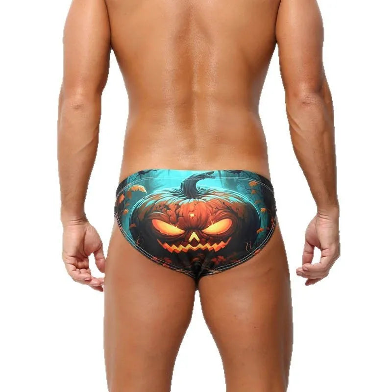 Men's low-waisted quick-drying briefs with digital print design on polyester fabric.