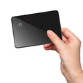 Black NFC pet tracking card with wireless charging, measuring 85mm by 54mm with hanging hole
