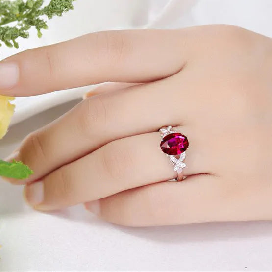 Women's butterfly ring with heart design in 18k rose gold plating, red and blue colour options