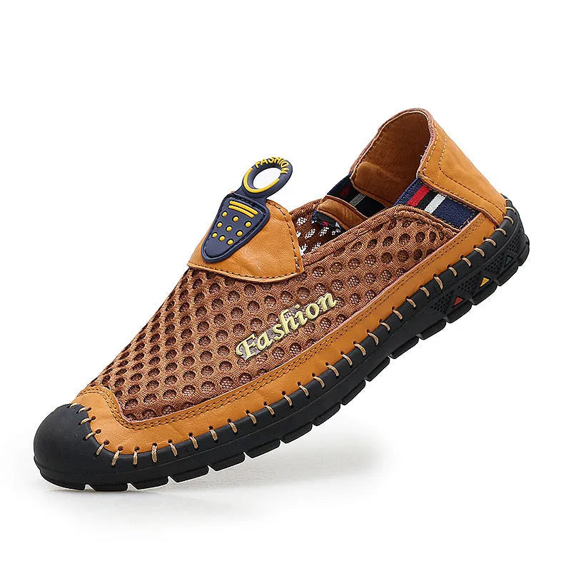 Mens brown casual shoes with mesh fabric uppers and rubber soles on a white background