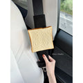 Toast bread safety belt shoulder pad in white toast colour on a car seat belt for driving comfort