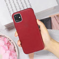 Genuine leather iPhone case with TPU bumper in Black, Brown, Navy Blue, and Wine Red colours for multiple models.