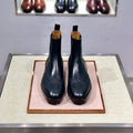 Business casual high top shoes with black cowhide leather upper and leather sole, side view.