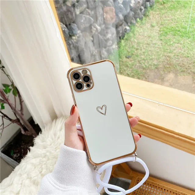 Electroplating hollow love TPU phone case with grey lanyard for iPhone 12