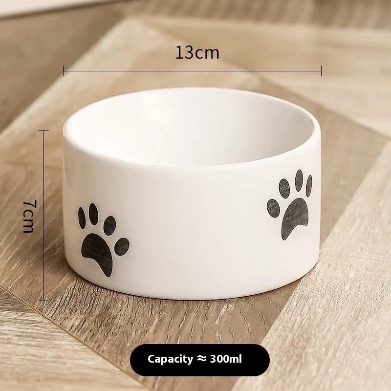 Ceramic cat bowl with high foot design in cat's paw pattern available in multiple colours