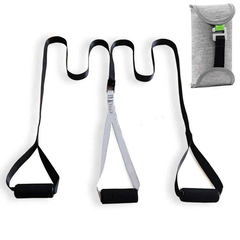 Black suspension training belt with nylon webbing and metal climbing hook on a gym floor