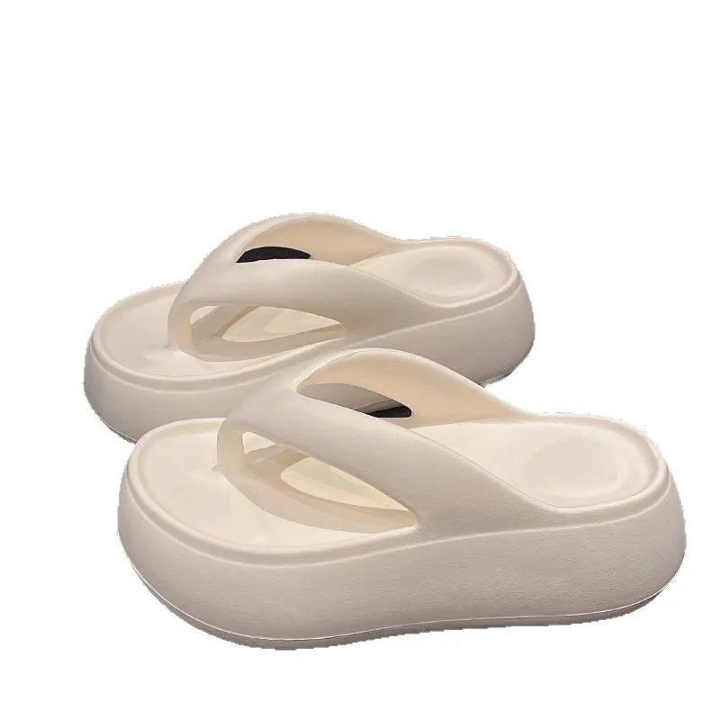 Women's thick-soled height increasing EVA flip-flops with herringbone strap in solid black