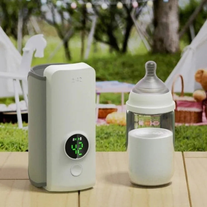 Portable wireless baby bottle warmer with USB charging cable showing wrap-around non-woven design