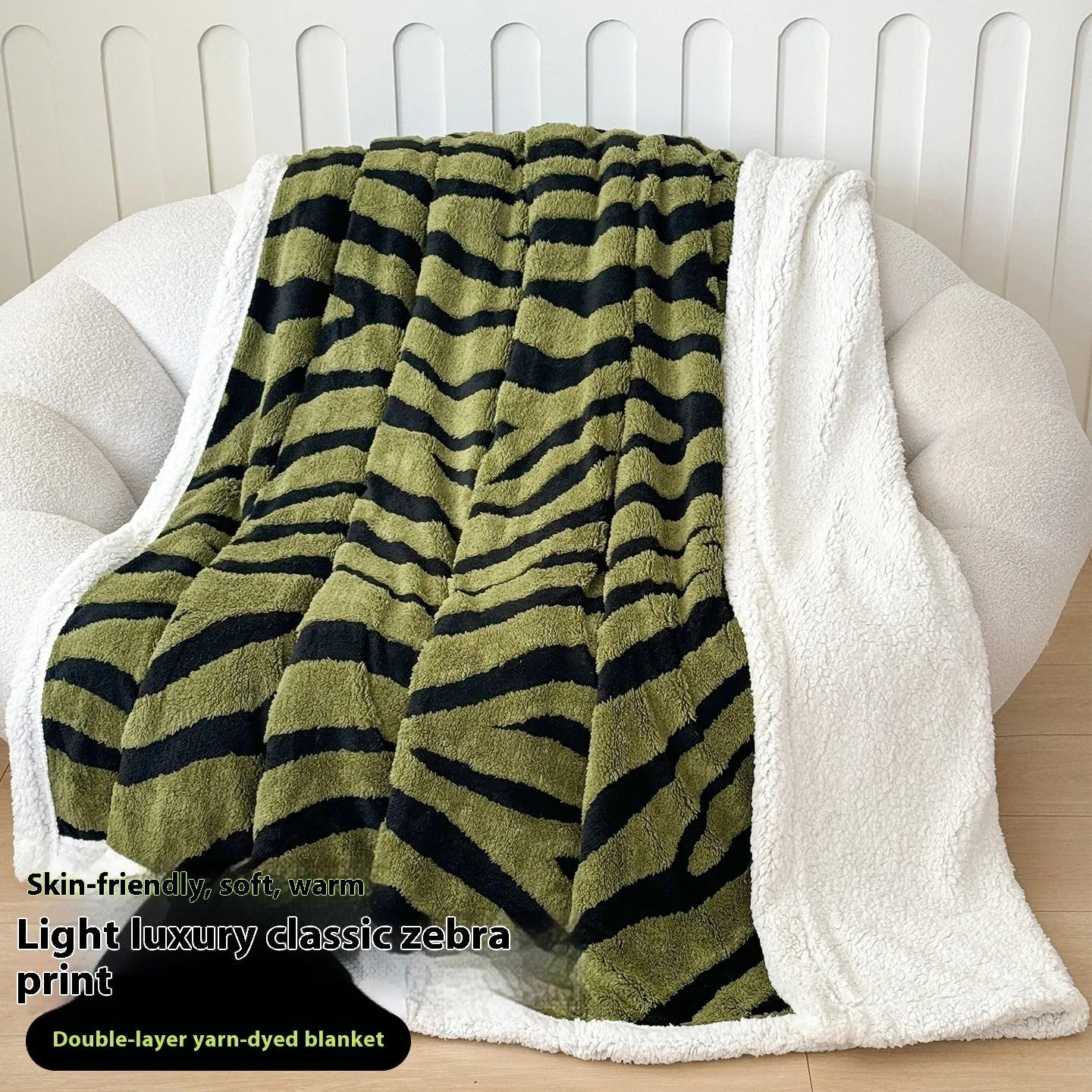 Double-layer taffeta blanket with woven leopard print pattern draped over sofa