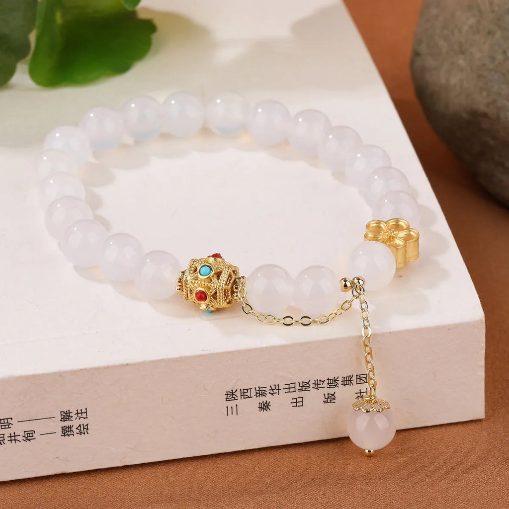 Handmade natural agate bracelet with peach blossom copper parts measuring 8mm