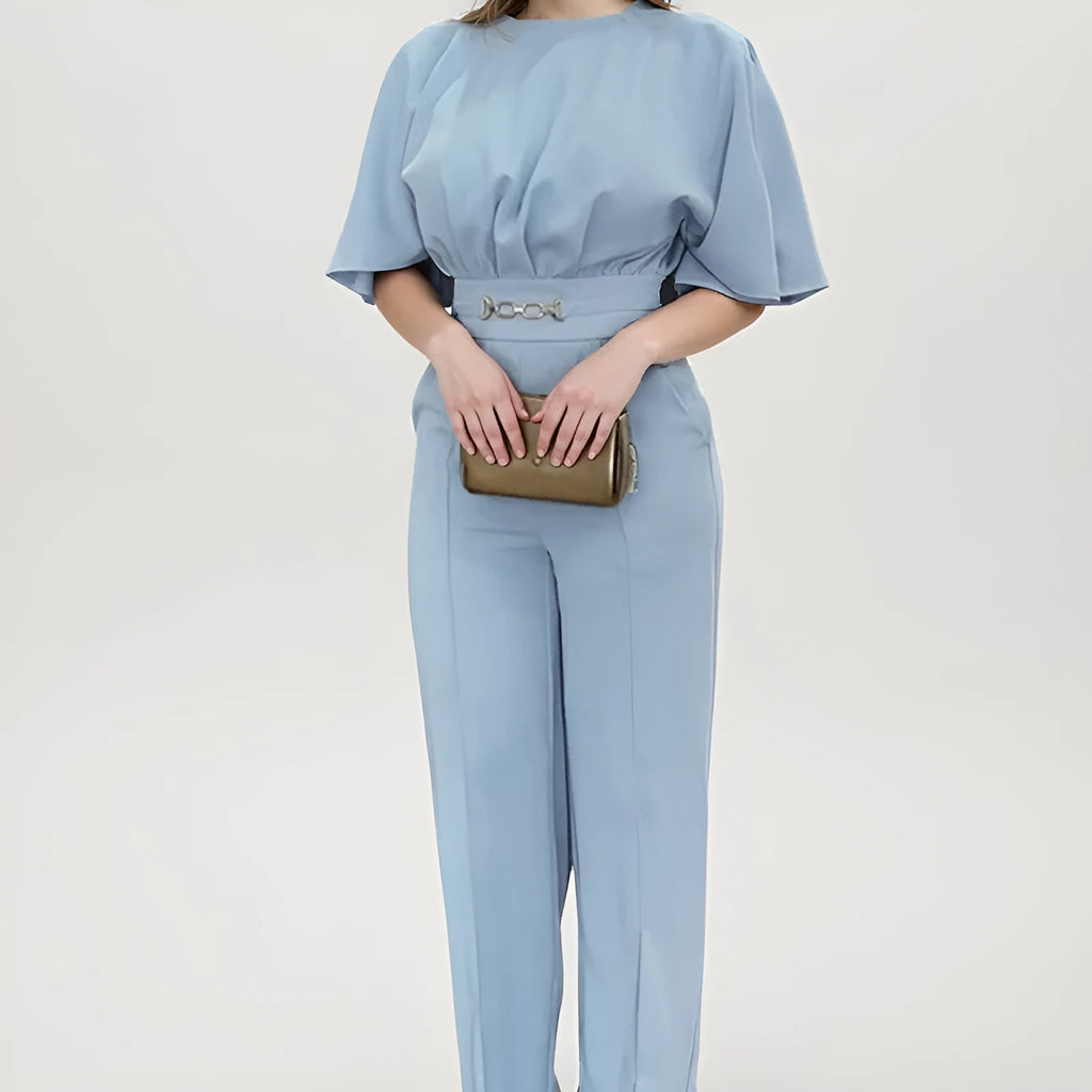 Blue men's two-piece polyester suit set with long-sleeved jacket and trousers on a hanger.