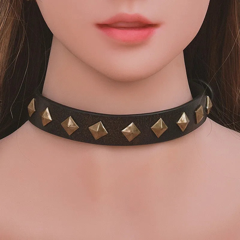 Bronze rivet cowhide leather punk collar with buckle closure on display