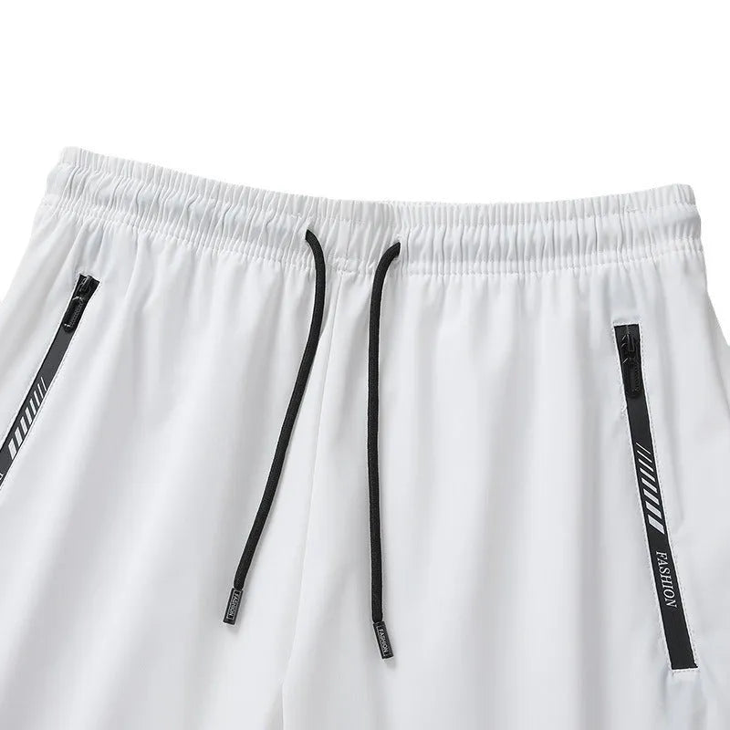 Men's loose fit quick-drying sports shorts in black, available sizes M to 6XL