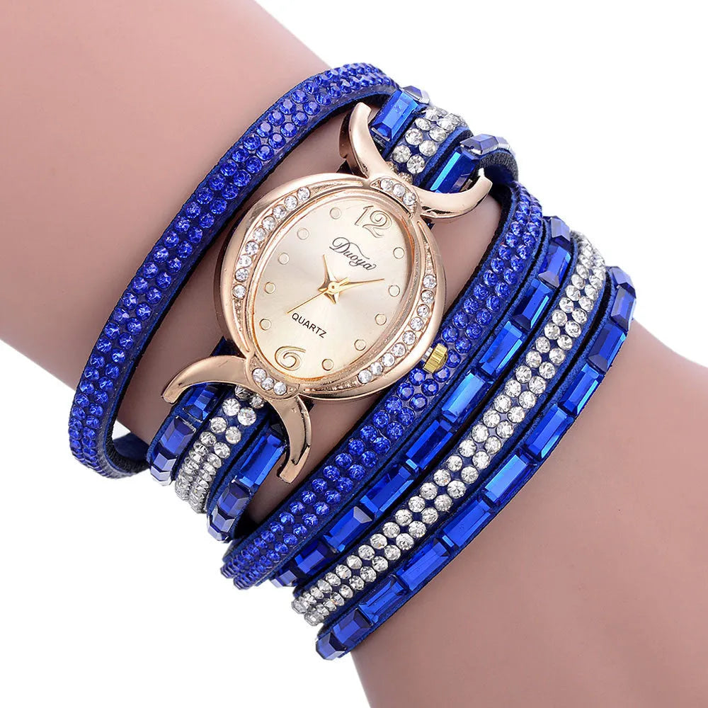 New casual rhinestone watch for women with round stainless steel case, leather band, and analog quartz movement