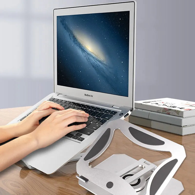 Silver aluminium alloy 360 degree rotating desktop laptop stand folded for storage