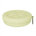 Portable plastic dog feeding bowl with integrated snack box compartment in light green colour