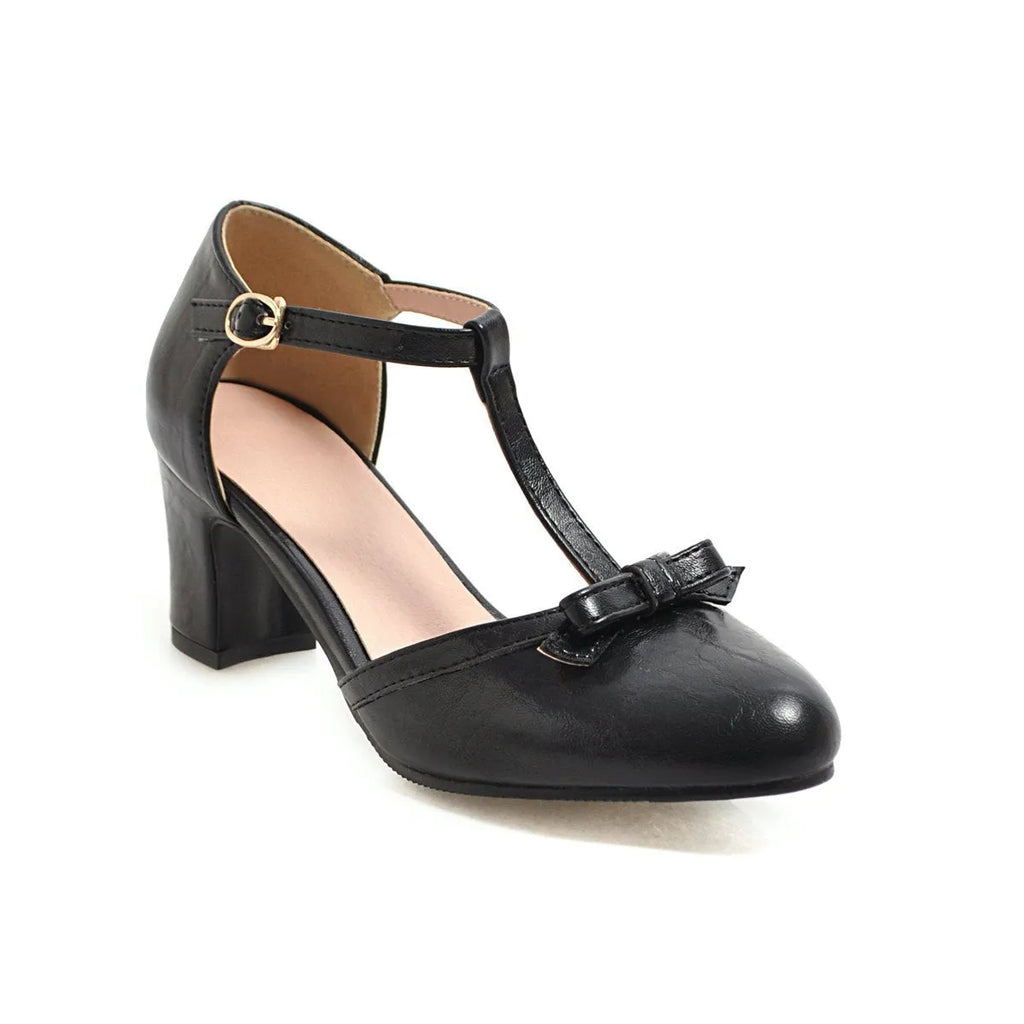 Women's chunky heel sandals with bow tie decoration and hollow out detail in apricot colour