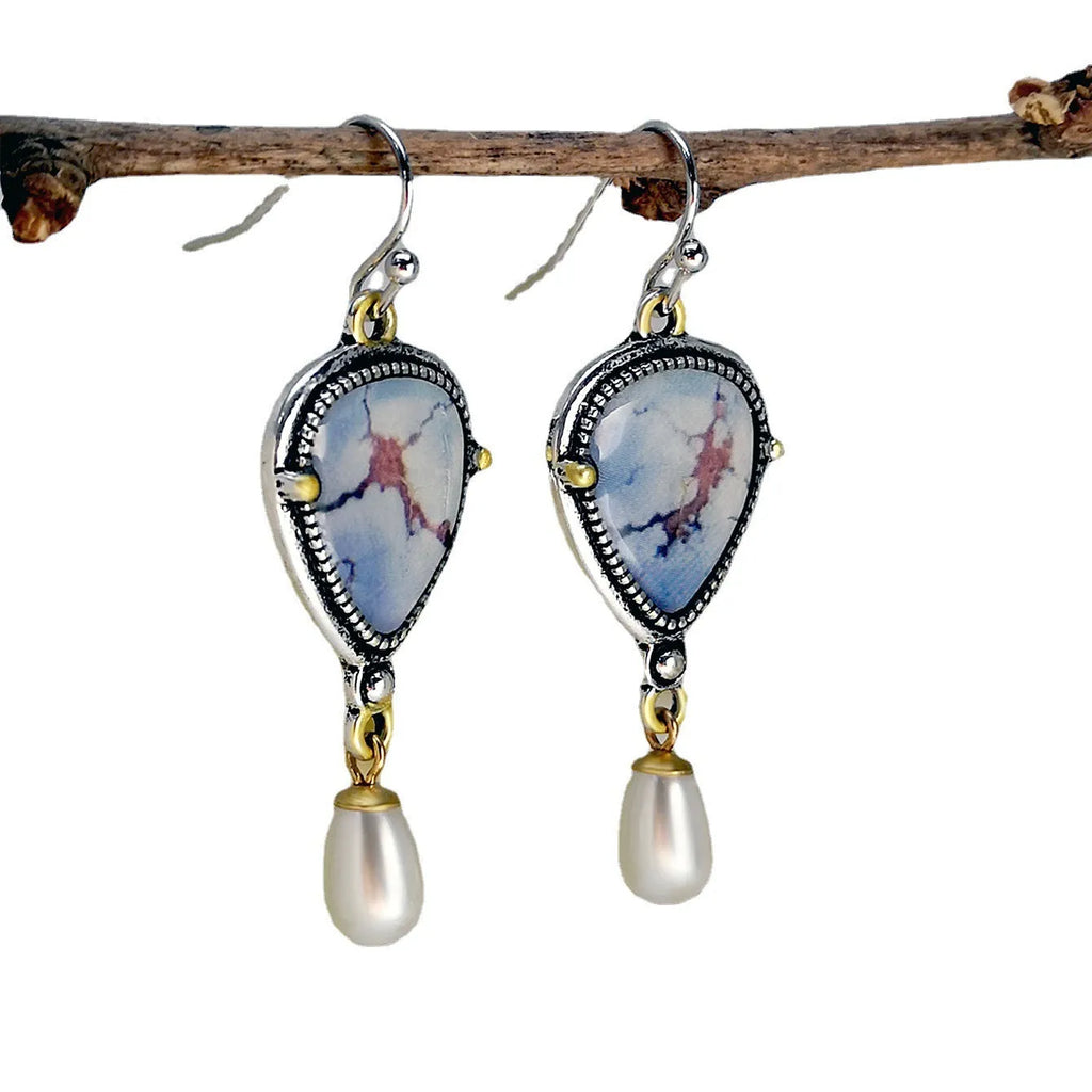 Retro blue Bohemian drop earrings with synthetic opal and pearl stones on geometric metal setting