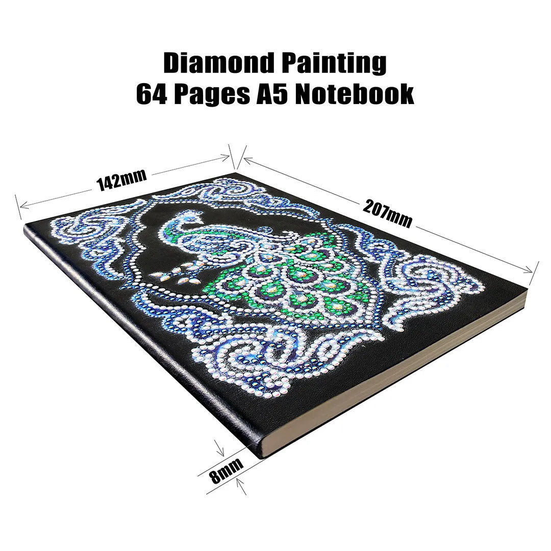 A5 black notebook with a peacock diamond painting design and packets of shaped and bright drill rhinestones.