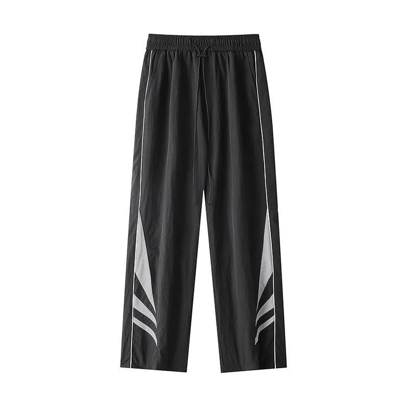 Men's black straight-leg summer trousers with an elastic waistband on a plus-size model