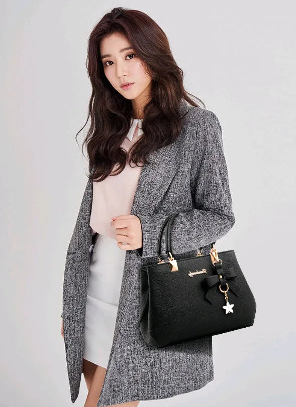 Women's medium cross section square PU casual shoulder handbag with belt decoration and soft handle